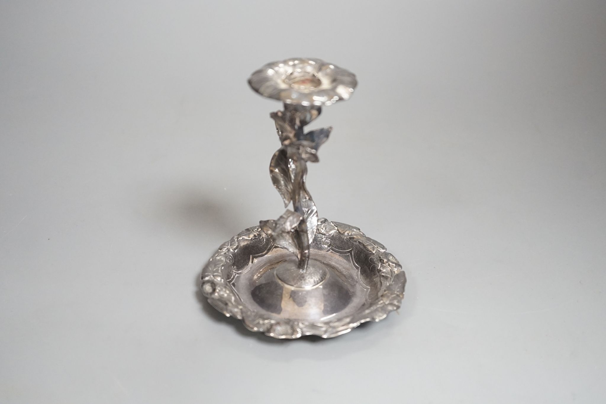 A George IV silver candlestick, naturalistically modelled as stemmed flower, London, 1828, by Riley and Sumner, 11cm, 145 grams.